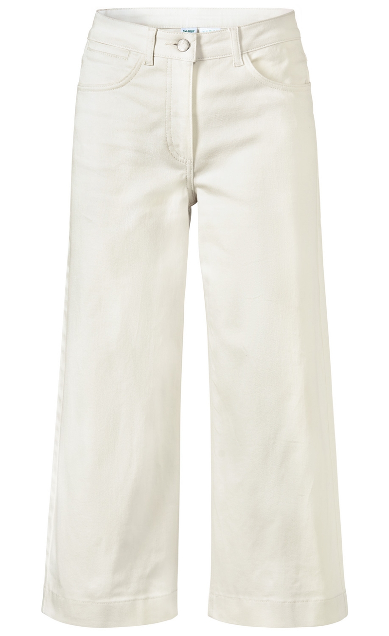 Baumwoll-Mix-Hose in hellem Beige, mit weitem Bein, Gürtelschlaufen, vorderem Knopfverschluss und zwei Eingrifftaschen vorne, aus weichem, leicht strukturiertem Stoff, knöchellange Passform.
