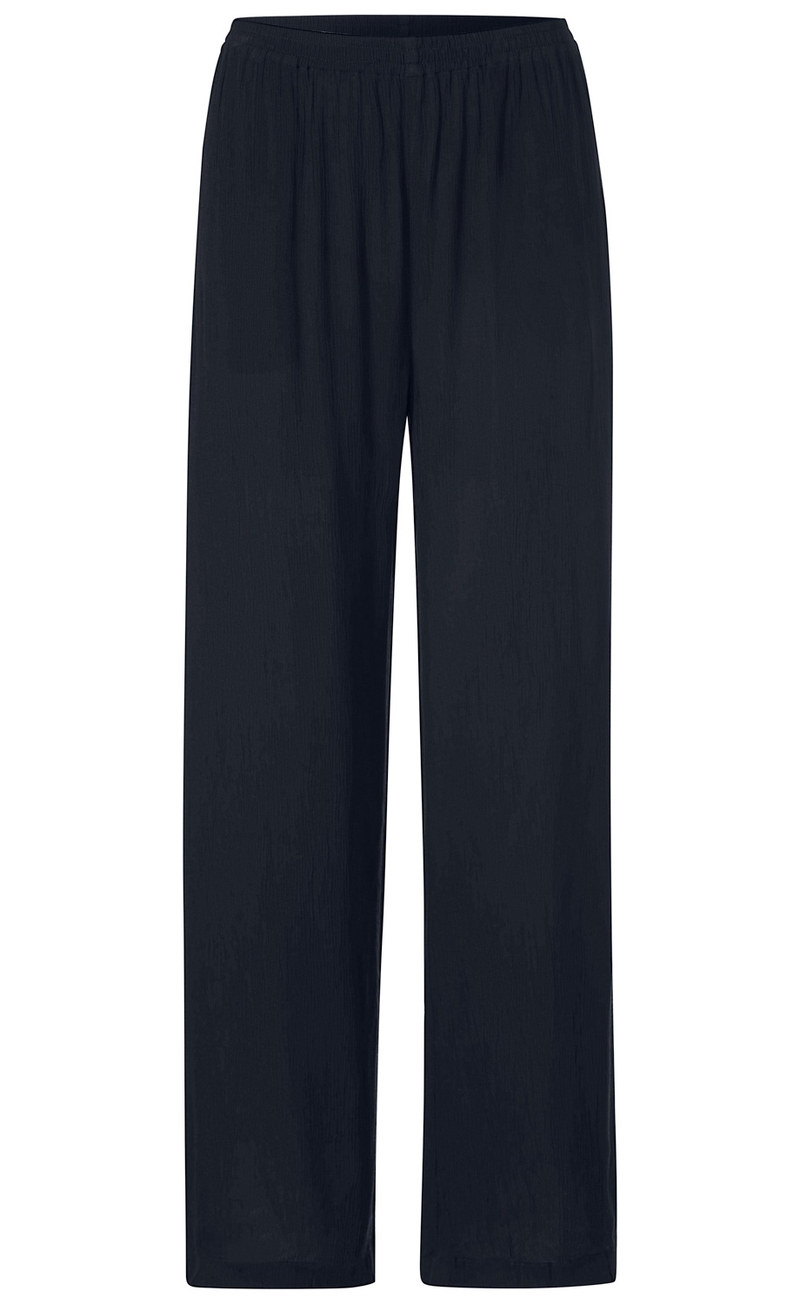 Dunkelblaue, gerade geschnittene Viskose-Hose mit elastischem Bund, ohne Taschen, aus leicht fallendem, fließendem Stoff, in schlichtem und zeitlosem Design.