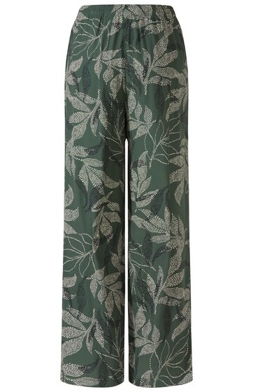 Grüne Hose mit weißem Blattmuster, gerade geschnitten, hoher elastischer Bund, keine sichtbaren Taschen oder Knöpfe
