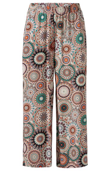 Weite Hose mit elastischem Bund, cremefarbener Grundton, bunte Mandala-Muster in Türkis, Orange, Braun und Schwarz, gerade geschnitten, knöchellang