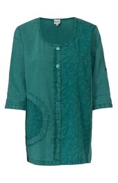 Grüne Damenbluse mit Blumenmuster auf der rechten Vorderseite, Rundhalsausschnitt, durchgehende Knopfleiste, dreiviertelärmel, runde Tasche links mit abgesetztem Stoff