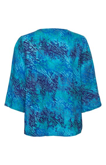 Blaues Damenoberteil mit abstraktem dunkelblauem Muster, langärmlig, gerade geschnitten, Rundhalsausschnitt, hinten abgebildet