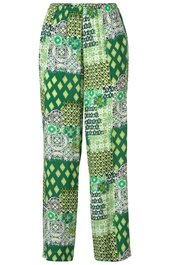 Locker geschnittene lange Hose in Grün mit gemischtem Muster aus Rauten, Kreisen und Paisley-Motiven, elastischer Bund, gerade Form
