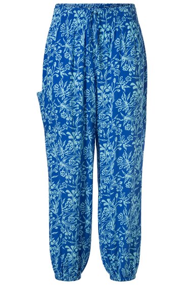 Blaue Damenhose mit weißem Blumenmuster, elastischer Bund mit Kordel, seitliche Taschen, weite Beine mit Bündchen unten