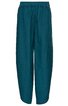 Locker geschnittene Hose in dunklem Petrol, elastischer Bund, gerade Form, ohne Muster, ohne sichtbare Taschen, ohne Verschluss