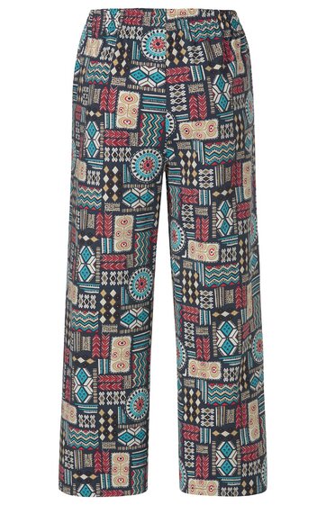 Locker geschnittene Hose mit elastischem Bund, gemustert mit geometrischen Figuren und Formen in Blau, Beige, Rot und Schwarz, gerade geschnitten, lang