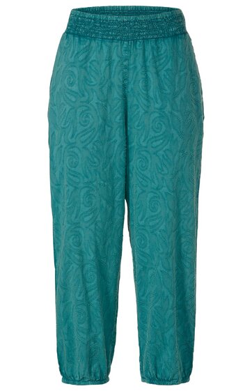 Locker geschnittene, petrolfarbene Hose mit eingeprägtem Blumenmuster, elastischem, gerafftem Bund, seitlichen Eingrifftaschen und elastischen Bündchen am Saum