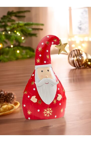 rote Weihnachtsmannfigur mit weißen Punkten und goldfarbenen Schneeflocken, langer spitz zulaufender Hut mit goldfarbenem Stern an der Spitze, runder weißer Bart und rosafarbener Gesichtston, stehende Form