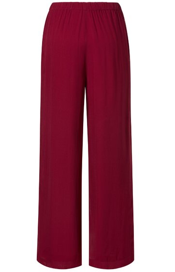 Weite, lang geschnittene Hose in dunkelrot, elastischer Bund, ohne Muster oder sichtbare Taschen