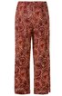 Weite Hose in Rostrot mit braunem und hellbeigem kreisförmigem Muster, gerader Schnitt, elastischer Bund, fußfrei, seitliche Schlitze am Saum