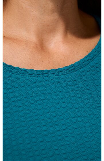 Türkisfarbenes Damenoberteil mit strukturiertem Wabenmuster, rundem Ausschnitt, ohne Ärmel