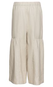 Beige Leinen-Hosenrock mit elastischem Bund, weiter Schnitt, leichte Faltenbildung und abgesteppten Nähten, knie- bis wadenlang, leichter Stoff, lässiger Freizeitstil