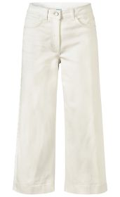Baumwoll-Mix-Hose in hellem Beige, mit weitem Bein, Gürtelschlaufen, vorderem Knopfverschluss und zwei Eingrifftaschen vorne, aus weichem, leicht strukturiertem Stoff, knöchellange Passform.