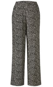 Viskose-Hose mit elastischem Bund, weit geschnitten, in Beige mit schwarzem Blattmuster, leichte, fließende Stoffqualität, elegante und bequeme Damenhose für Freizeit und Büro.