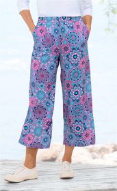 Viskose-Hose mit weitem Bein, buntes Mandala-Blumenmuster in Blau, Pink und Lila, elastischer Bund, seitliche Taschen, getragen mit weißen Sneakern, sommerlicher, lockerer Stil
