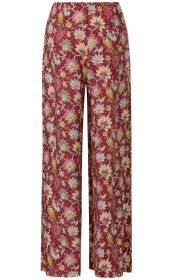 Viskose-Hose mit weitem Bein, rotem Grundfarbe, floralem Muster in Gelb, Weiß, Orange und Blau, elastischer Bund, gerader Schnitt.