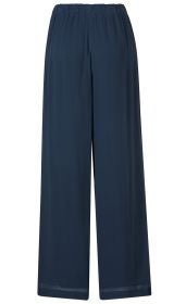 Dunkelblaue, weit geschnittene Viskose-Hose mit elastischem Bund, glattem Stoff und geradem Bein, ohne Muster oder Taschen, schlichte lässige Damenhose